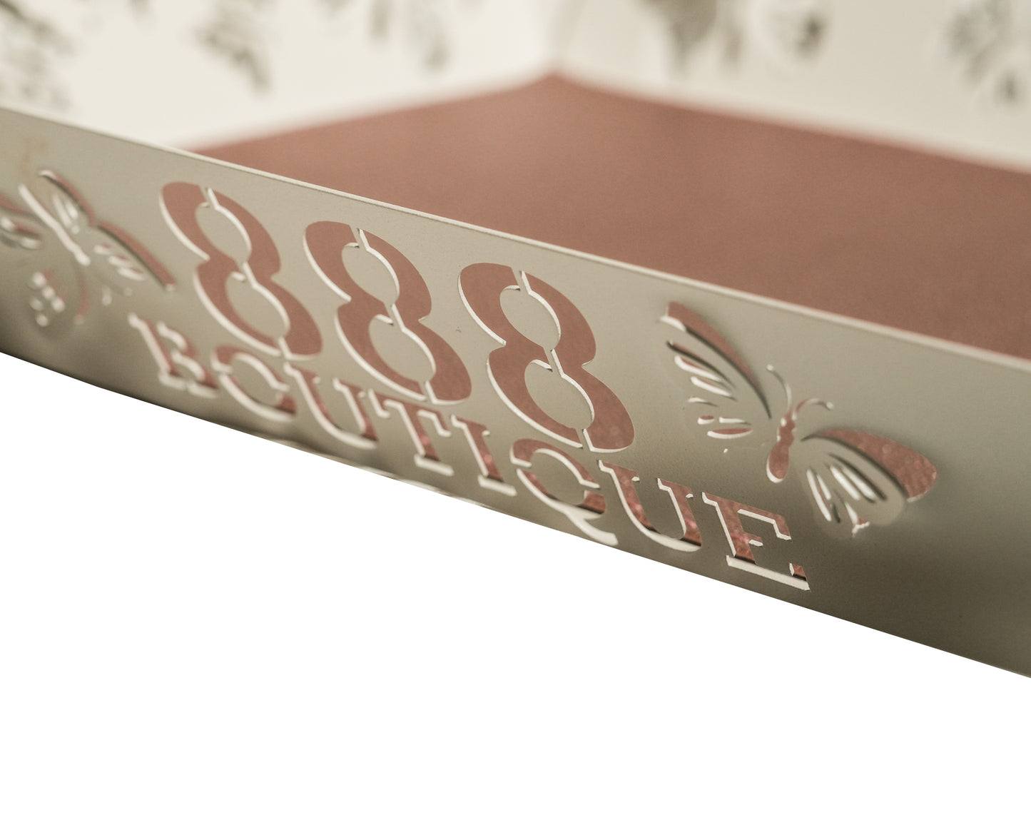 Metallic white tray with '888 Boutique' background